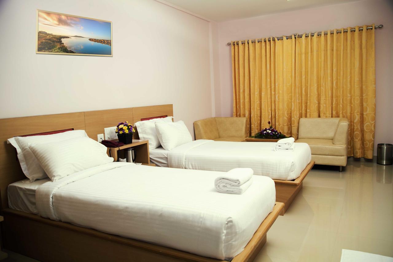 קאנור Hotel Rainbow Suites מראה חיצוני תמונה
